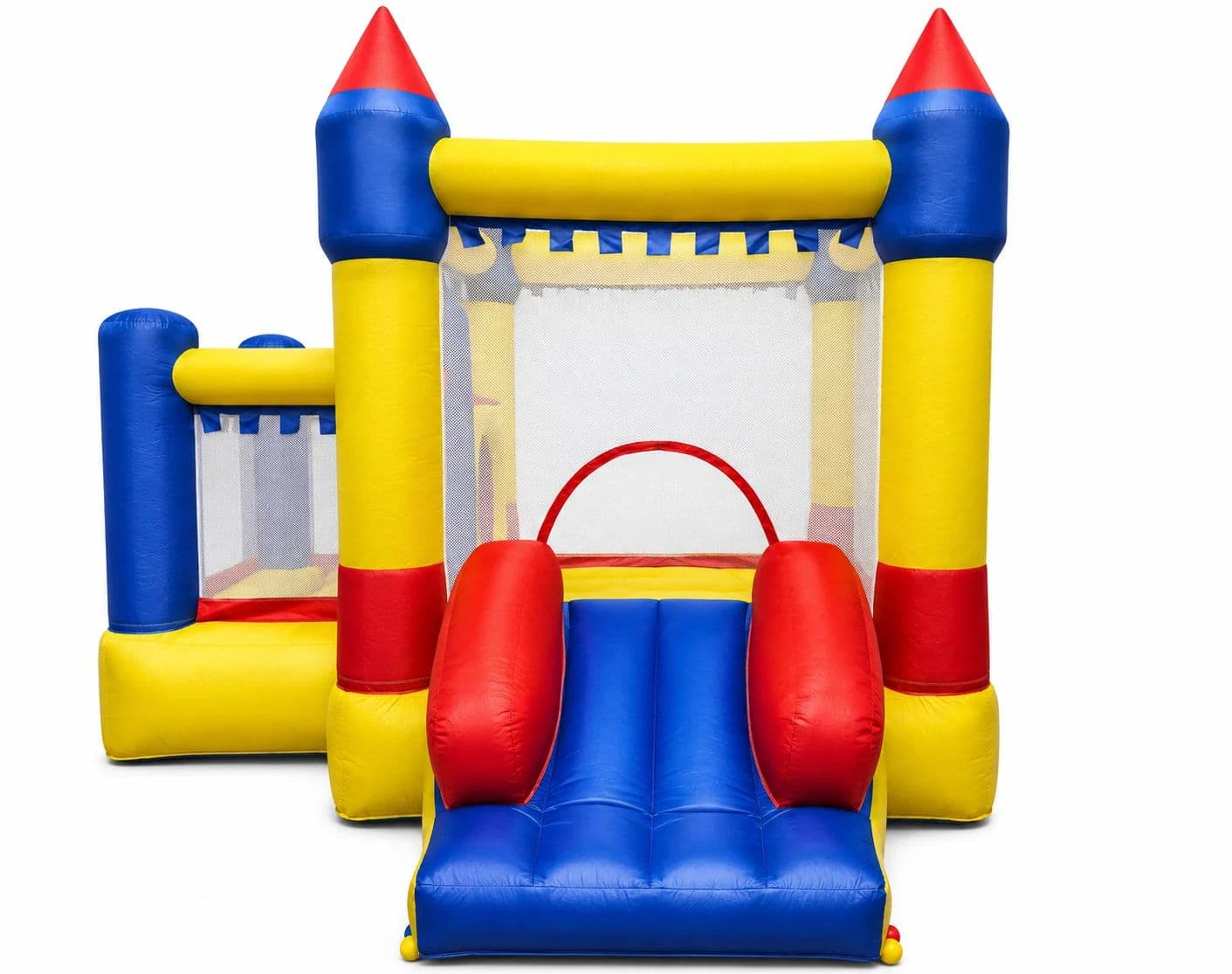 Colorful red, blue, and yellow castle bounce house with turrets, an interior basketball hoop, and an attached slide